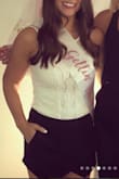 I wore this with a black mini skirt to my bachelorette party - it was super cute! I was a little concerned for the chest area but it fit well and I wore a backless bra that sticks on the sides. Would recommend! - Jenna S.