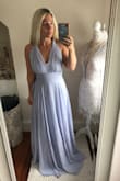 This was an option for a "pick your own" bridesmaid dress for my sister in laws wedding. It was a beautiful dress but I ultimately went with another dress that fit her theme better. The length was long and would need to be hemmed. It was also pretty snug on the bust and waist. There was no stretch/give. Otherwise it's really beautiful and can be worn so many ways! - Christina A.