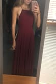I love this dress! It is a beautiful color, the neckline is classy, and it is of high quality material. I wore it for a Senior Recital and it was perfect for the occasion. I did have to alter the length, it was too long for me. I enjoy that the straps are adjustable! - Rachel P.