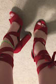 The shoes were a wonderful red color. Exactly what I wanted. They tie up nicely and if you're afraid they are going to be lose don't be because you can tighten them!! - Laurel R.