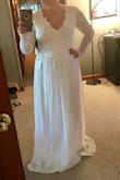 The lace is beautiful and I love the style. I did find that due to the open back the dress didn't allow for as much movement as I would like for my wedding. It also would shift around and I just didn't want a high maintenance dress. Beautiful dress but not for me. - Michi M.