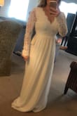 I will be wearing this for my bridal shower next weekend. I love the way it looks on, although if you are more broad in the rib cage area it may be a little tight considering what size you order. I wear in between smalls and mediums usually, and I ordered this in a small. It was a little bit of a challenge to hook in the back, but once I got it I felt secure. I do have to get it hemmed because it is fairly long. But besides that, I love it!! - Elizabeth R.