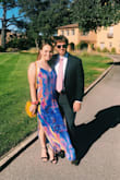 I wore this dress to a wedding and loved it. I will say, however, it was incredibly long. I had to wear 4 inch heels in order for it to just skim the ground. Worth it though. - Johna R.