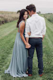 The dress was beautiful and just what I was looking for for my engagement pictures. I actually ended up removing the tassel ties from the shoulders for a more formal look. I LOVED the length!! If this dress came XXS I totally would have opted for that. It was a little loose, but did what it needed to. - Calla F.