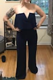 This looked so much better on than I could've imagined! I ordered a Large and an XL, and ended up wearing the XL, because I was wearing it to officiate a wedding, and didn't want it to be too tight. I got compliments ALL NIGHT on this outfit. Another woman was actually wearing it in Red and also looked like a total bombshell. Did have to take about 2 inches off the length even with 3 inch heels on. 10/10 would recommend. - Anna V.