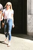 This crop top is long enough to still cover my stomach with medium to high-waisted pants! I wear this shirt ALL of the time - probably too much. Very comfy and causal, but still makes it look like you put effort into getting ready! 
Runs true to size! - Skye M.