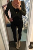 I think this shirt looks best with the twist in front I tried it with the twist in the back and it looked a little odd. It was super cute with a black body suit + black jeans and booties for going out to dinner with girlfriends. A cute top that can be dressed up or down! - Melissa H.