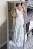 I loved the detailed lace on this gown and how the material was so soft and comfortable to wear! I took it to my seamstress for a quote to get the adjustable straps customized for me, scoop the back lower and hem the length, and overall it would be am extremely affordable wedding dress!! I picked a different Lulus gown, but this was a very close second. - Christine M.
