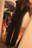 I loved this print and the fit in another style, so I thought I'd try this one. The backless is so nice. The waist tie is long so I guess you're supposed to wrap it around your waist twice. As my other lulus pieces, the pants are long but I'm tall enough that it's fine with heels. Very flattering overall! - Ginevra C.