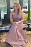I wore this dress to my sisters wedding. I received a lot of compliments. The only thing I had wished I'd done was order a large instead of a medium, it was extremely tight in the chest and stomach area. I had alterations take as much out as they could out but it was very limited. Still overall the dress was very pretty and very well made. - Jessica S.