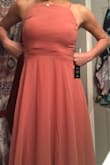 So I am happy with the dress; the only thing I will say is the color shown online and what I received are a LITTLE off. The quality of the picture of the model wearing this dress could've been a better quality in which showed what color the ACTUAL dress was. (online it almost looks like a PEACH/summery feel).  But overall I am happy with the dress considering the wedding I am going to is in October (Fall) wedding it'll actually work! - Jessica P.