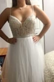 This dress is beautiful. I tried it on as a potential wedding dress. The tulle was a little too Cinderella for me so I chose a different Lulus dress. Lulus dresses are quality pieces for incredible prices. Would recommend! Sorry the lighting in the pics aren't great. - Sabrina K.