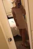 I absolutely loved wearing this dress to a wedding. It was a little tight but I definitely wouldn't size up. It was also shorter than I expected and since I have a long torso I felt the need to pull it down a lot but other than that no complaints. I was really worried about it being see through but the fabric was thick so it wasn't a problem at all. Highly recommend this dress. - Lexi I.