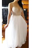 The top is perfect, good quality and looks expensive. The only trouble was to  get it shortened at the front so it looks like it has a long train. If you are tall 5'6" above, there is no need to get it shortened. But I still love the dress! - Jean L.