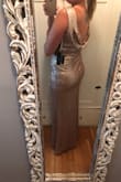 I purchased this dress for my bridesmaid to try on as they were looking at similar ones at the bridal shops for over $350. I was pleasantly surprised when they arrived and looked good on all of my bridesmaids who have very different body shapes. The dress feels a little small at the top (share the zipper is) but is otherwise quite stretchy all around. The only downside is how fast the sequins fall off but I think that's likely the case with all sequin dresses. - Rena B.