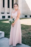 I ordered this dress for a wedding I was a bridesmaid in and the bride was looking for a blush color palette. The color of the dress looks a lot lighter in sunlight in comparison to the photos. It was tall for me but I'm short, so I had to get it hemmed, It fit well everywhere else, including my larger bust size. If you're smaller up top I would say size down as the straps are not adjustable and it may be big. - Emily N.