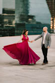 I bought this dress to wear for our more formal engagement photos and it was perfect! I fit very well and my chest felt very secure. The color it absolutely gorgeous in person. A little more purple/fushia than I expected because the photo online looks more Burgundy in my option, but I was so happy with what I received. We just got out photos back this week and everyone has complimented the dress. I would definitely recommend that you buy this dress!! - Jillian R.
