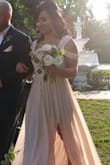 I bought this dress to wear as a bridesmaid at my brothers wedding, the dress is absolutely gorgeous and I had many compliments.... I went with the medium after reading other reviews because I worried about the small being uncomfortably tight... I'm so glad I did because it was perfect...I had to get the length hemmed but that was expected, and I had a slit added....the only downfall I have is the dress arrived extremely wrinkled and the seams on the chest didn't line up and looked very baggy and messy, I had to have it professionally pressed so they would lay flat, other than that the dress is beautiful and the perfect choice for the occasion. - Casey B.
