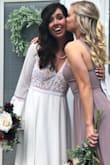 I wore this dress for my reception at my wedding and it was gorgeous! I had to have it hemmed but other than that it fit perfectly! Everyone told me I looked like a Woodland Fairy. - Grace S.