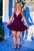 I originally ordered in medium because I have a very athletic/muscular build, and was afraid a small would be too tight on my arms and back. The medium was too loose, but I easily changed it out for a small which fit perfect. The material is a little stretchy but looks high quality. Love the shorts feature since it is a shorter cut (until you're awkwardly naked in the bathroom). Beautiful color, got many compliments! - Alison S.
