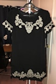 I bought this dress for a fall wedding. It is both conservative and classy. The T-shirt style makes it very comfortable. I'm a size small in everything that I buy. I purchased the small in this style and it fit perfectly. I also thought the quality was amazing. - Sarah D.