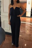 I wore this to a wedding reception and received so many compliments on this jumpsuit! The material is super comfortable - fitted but stretchy and in no way restrictive. I have short legs (inseam is ~28") so I had to have around an inch taken off so that it still just touched the ground wearing 3" heels. I can definitely see myself wearing this to other events. - ROBYN M.