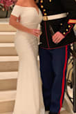 Stretchy material so it fit great. I wore spanx under so there was a little bunching but still gorgeous! - Shelby S.