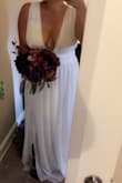 Gorgeous dresss! Great material... it's a little long, but I want it to drag a little for my wedding. Overall a great buy! - Genesis R.