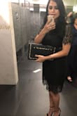It's a beautiful dress, and I received lots of compliments. It does run a bit large, but I was able to still manage. Very classy. - Ana E.