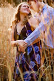 Such an amazing dress! I absolutely love that you can tie the back to make the front looser or tighter (this was great for engagement pictures so I could hide the cleavage). Beautiful! One thing I would say is it runs very LONG. I am 5'10 and had 4 inch heels on and it still drug on the ground. Besides that it was wonderful. - Tailor R.