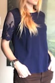 This shirt is beautiful in person. The sleeves really set it off. My roommate accidentally put it in the washer AND dryer and it made it out unscathed.
The fabric is very professional for a work environment (not see-through). Tuck it into high-wasted pants or wear it with something low wasted. It's a great length for both. - Alana C.