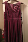 Bought this for a bridesmaids dress for a friend's wedding and I'm in LOVE!! Such a nice quality dress and looks great on. I usually get size L or XL and this is even a little loose. I am going to have to get it hemmed because it is VERY LONG so I might just get it taken in here and there to make it perfect. 10/10 would recommend. - Erin S.