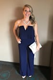 I have a difficult time finding jumpsuits that are flattering, but this one finally did the trick! It fits true to size (I did need to get it hemmed because I am short), the material is super nice, and the opening at the bust gives it just the right amount of a subtle sexy appeal. I had so many compliments on this jumpsuit! It's a hit! - Rebecca T.