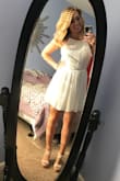 This dress is comfortable and cute but not the best if you'll be sitting for a long period of time! I wore this to my college graduation and it was very wrinkly by the time it was over. Which is fine, just be sure to take pictures in it before sitting! Attached pictures with the before and after. - Sarah M.