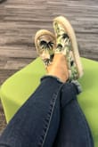 I bought these shoes on a whim and I'm so pleasantly surprised by the quality and softness of these shoes!  Very well made and I don't want to take them off, not to mention the cute pattern.  Compliments everywhere I go!  Runs true to size.  Highly recommend for a fashionable pop of fun. - Meghann B.