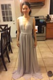 It's a beautiful dress. Wore it for a wedding. Very nice and flowy. I got an XS, but it was still big on me. Very long too! I had to have altered to fit me right. But the dress is very nice! - Paola G.