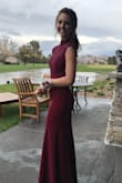 Loved wearing this to prom. Bought an extra small but wonder if a small would have been better. Loved the open back and lace detail on the front. Classy looking and material was a nice weight. Received many compliments! - Lori C.