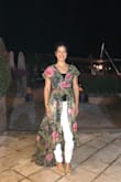 Love this style with shorts, jeans, or white pants. It's long so I wore it with a wedge. - Elisa T.