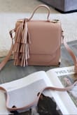 This purse is adorable! I love mini purses because they're perfect for carrying just the essentials and this one is perfection! It's really sturdy, has an easily adjustable strap and I use it every day now! - Celestia W.