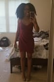 It rides up a bit, but not uncomfortably so. If you're between sizes..size up to prevent that. No bra needed, good quality, support, and coverage up top. Will wear again. - Jasmine B.