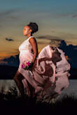 I absolutely loved this dress. I ordered a large. I had to have it hemmed. I also had the seamstress add bra cups. I wore this dress for my 10 year wedding anniversary vow renewal on the beach. The material and color was perfect for the beach. - Sabrina C.