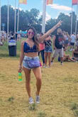 I LOVED wearing this top in 2 colors to a music festival! I bought the blue and the rust color. It stayed in place both days and It was so comfortable. The straps are adjustable which was helpful. - Patricia B.