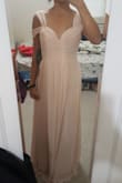 Pretty dress! A little bit tighter than the usual XS I order from Lulus when trying to zip up but not comfortably tight. Not very long either. I am only 5'3" and usually lulus dresses are quite long on me. Color is very pretty too. - Ei E.