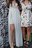 I wore this dress to my rehearsal dinner. I got so many compliments on it. My only issue with it is the top sticks out/ is open/loose because of the metal that's inside of it shaping the breast area. I felt like that people could see down my dress when I sat down, and this was even after getting it taken in a bit to tighten up the straps. - Jovana M.