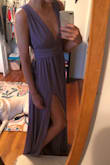I bought both the small and medium. I was cutting the delivery date real close to the wedding and wasn't sure about size since I almost always have to buy dresses in larger sizes because of my height, which sucks because I am rather slim. The small and medium fit great but I felt more comfortable in the medium since there was more fabric around the bust and I knew I could dance & drink the night away comfortably. The wedding day weather ended up being kinda chilly (50's) so the heavier fabric was perfect. I loved the slit and it wasn't "too much". The picture I added is of the medium and I returned the small. Great company, beautifully made! - Jodi S.