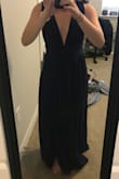 I originally ordered a medium because of the sizing guide, but I had to return the medium and then I ordered the small. The small fit perfectly and I'm ready to wear it for my friend's wedding. - Kadie H.