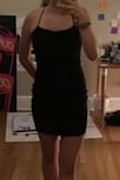 Straps were definitely too long, but easy to fix with a little sewing or pinning. Material is thick so it's not see through but not heavy either. - Emma W.