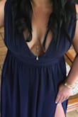 I love this dress!!! It's true to size. Bought it in navy blue for a wedding and will be buying it in burgundy for another wedding!!!! Absolutely love the dress!!!! - Jacklyn C.
