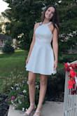 The dress was a bargain & fit perfect. The button did come off on the top of dress very easily but come with a spare & simple to put back on. - Veronica H.