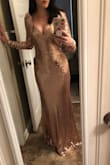 It was a little loose up top, had material in the back that I had to get taken in just a bit, but other than that - PERFECT! I bought it for the military ball and it was so affordable and gorgeous! Couldn't have found a better dress! - Tayler W.